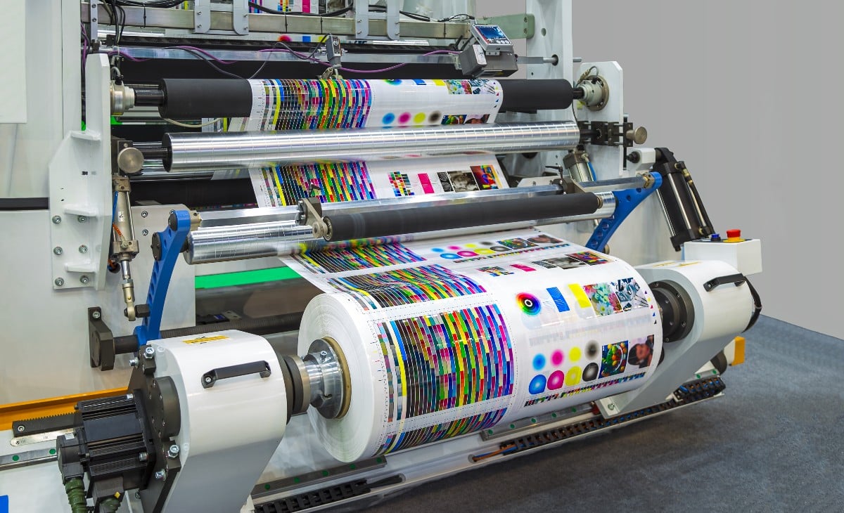 One Stop Mail Offset Printing Large Format Printer Running a Paper Through Multiple Rolls web