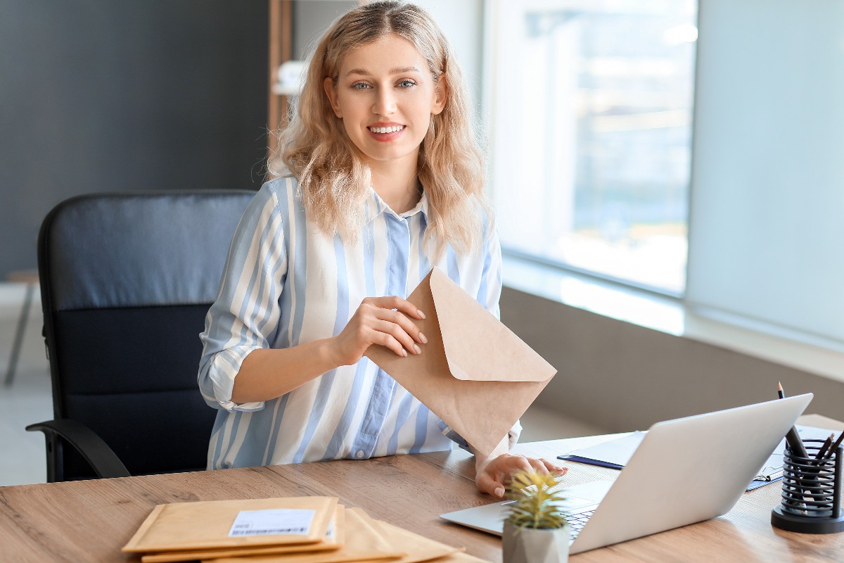 home improvement woman receiving mail in front of computer web